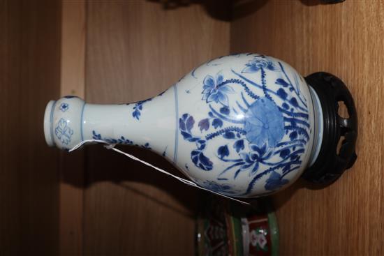 A Chinese Kangxi blue and white bottle vase, on hardwood stand vase excluding stand 23cm